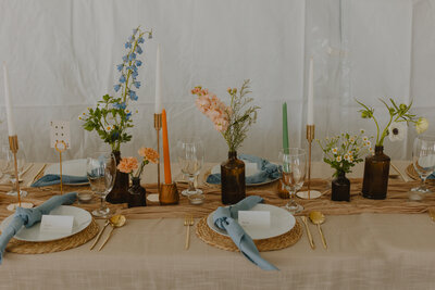 Inside the Cottage at Riverbend tent with colorful yet neutral decor details