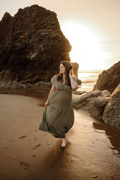 Photography mentor walking on beach. 