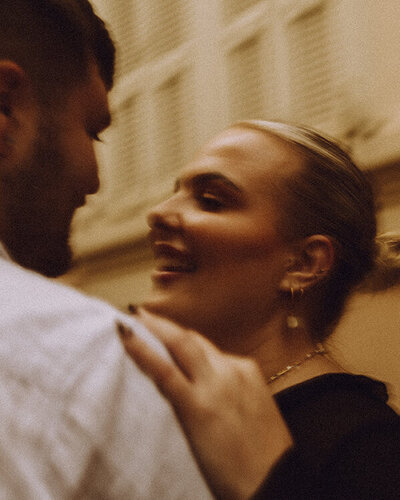 A loving portrait of a couple looking at each other in the South of France. Captured by Eilish Burt Photography