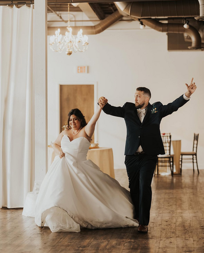 Bride and groom celebrating after their wedding ceremony.