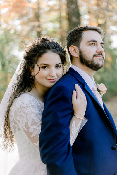Bride and groom walk up memorial steps at their DC wedding