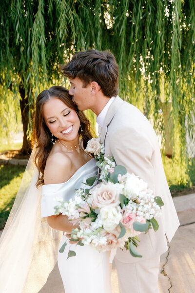 Radiant Bride Surrounded by Colorful Flowers – Stunning Wedding Portrait