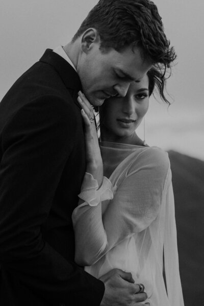 Bride and groom snuggle together during their Ouray elopement.