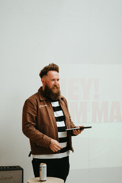 Mark Horton giving a talk on branding at a wedding photographer workshop. 
