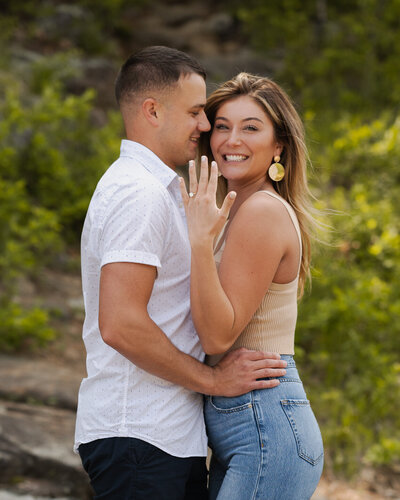Showing off the ring after her Adirondack Mountain proposal.