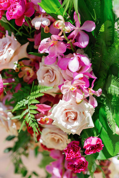 Bright pink, white, and green flowers 