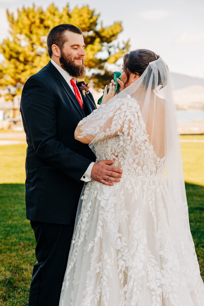 Bride and groom emotional first look moment at Kwataqnuk Resort and Casino