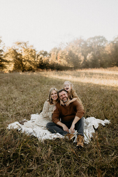 Mom holding her baby for family photos in Marietta, GA.