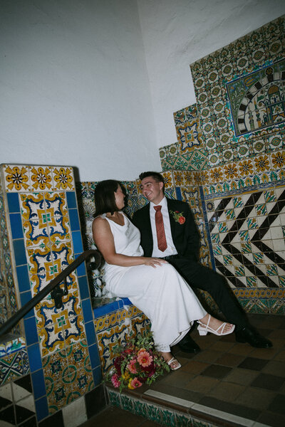 bride and groom pose for portraits with bouquet by idaho photography Erica Rochelle 