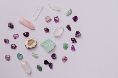 collection of crystals and colored rocks