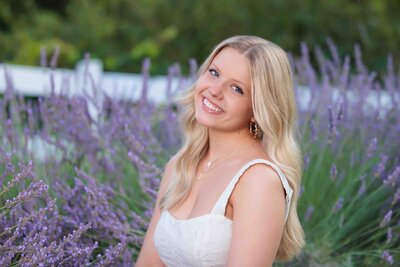 Fun high school senior portraits on a rooftop in Raleigh.