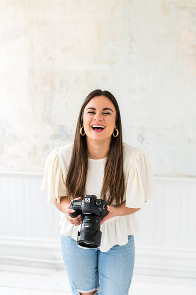 photographer marissa elise campbell smiling with camera