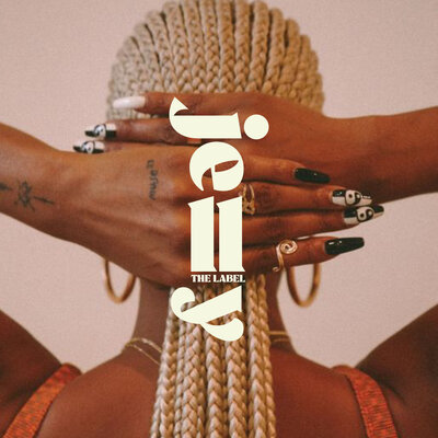 Jelly secondary logo on image of woman touching her hair