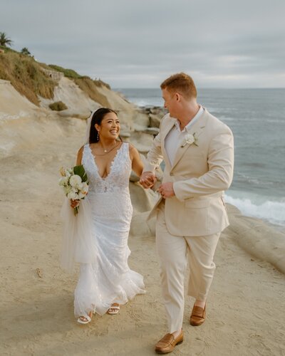 couple hugging on beach
