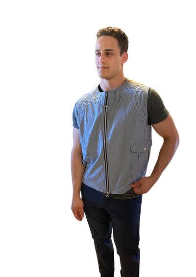 Alex wearing light blue upcycle Men's Vest