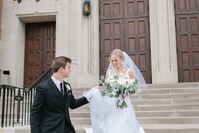 bride and groom at cathedral