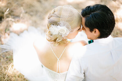 Bride and groom with heads together