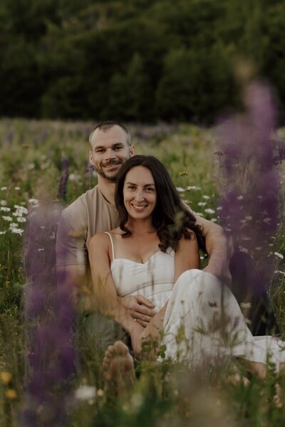 bride and groom embrace after wedding in new hampshire
