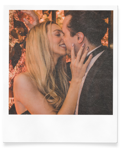 couple kisses during engagement session in las vegas
