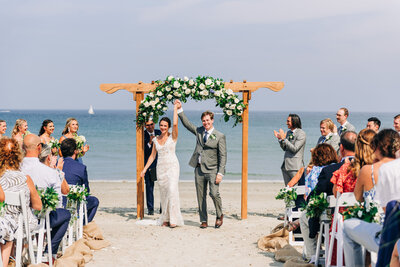 A couple strolling after their wedding ceremony at Glen Magna farms in Danvers