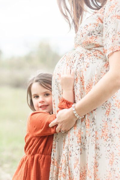 Family of 4 Lifestyle Maternity Session taken by Ann Arbor Newborn Photographer