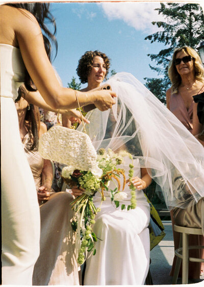 35mm film photo of guests during a Jewish wedding ceremony in Italy