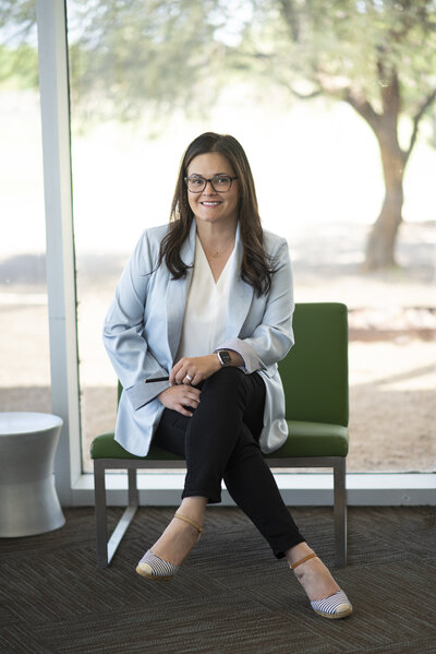 Luisa Kidwell in a blue blazer sitting and smiling – Career and Communication Coach at Kidwell Coaching and Consulting 5
