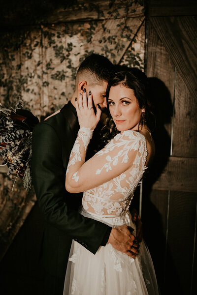 Bride and Groom posing for their bridal portraits at the Delamater House wedding venue in Orlando florida