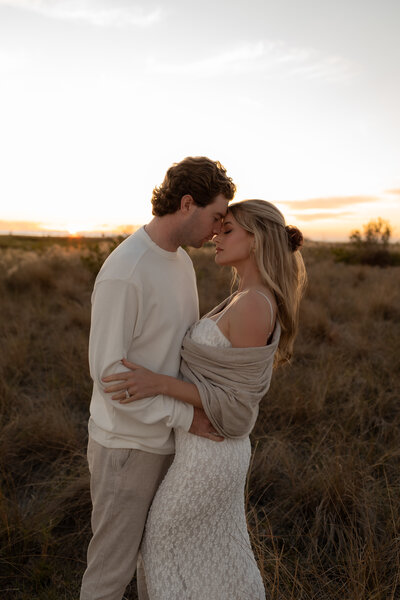 couple on the beach for engagement photos in florida