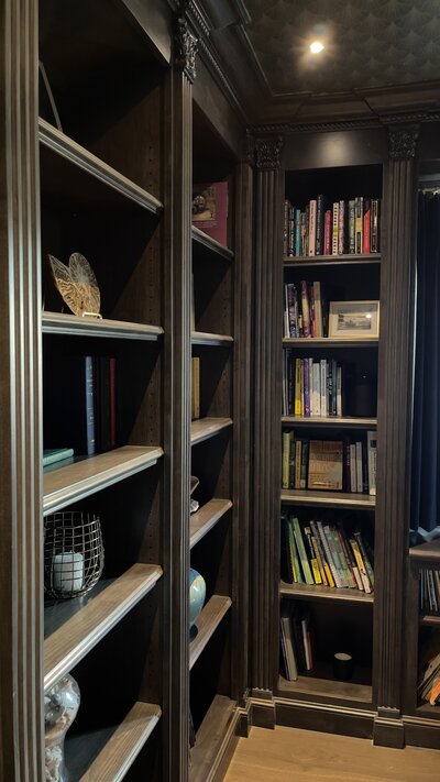 Featuring custom bookshelves, ceiling wallpaper, and furniture selection designed by Just Design Resources