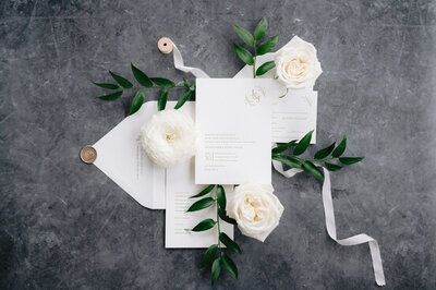 A Black and white invitation suite by Dana Osborne Design. Photo by Anna Brace, a photographer who specializes in Des Moines Wedding Photography.