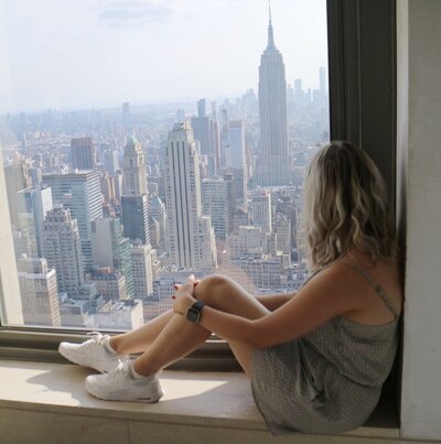 Sitting at top of the Rock, in New York City