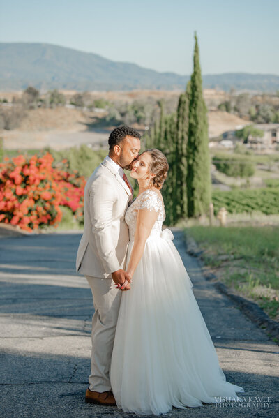bride and groom embracing