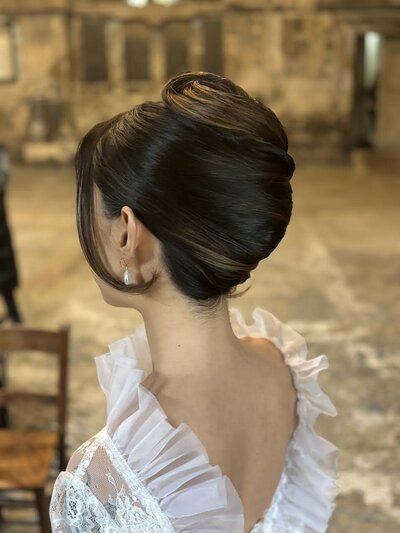 Sabrina Duparcq Hair Artistry's modern french pleat hairstyle for her beautiful bride in Central London