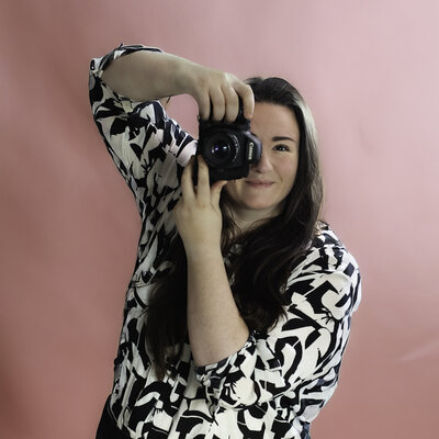 photographer holding camera