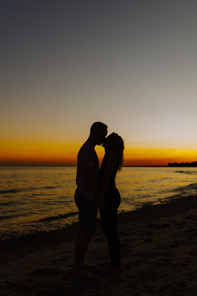 bride & groom kissing