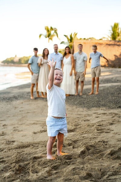 Family portrait on the beach, taken by Hawaii Adventure Portraits, photographer in Kailua-Kona