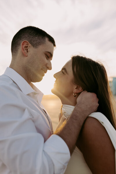 Romantic embrace during a golden-hour elopement in Charleston south carolina