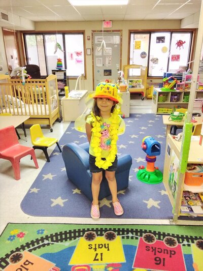 Young Girl Playing Dress Up CPC Albuquerque Daycare