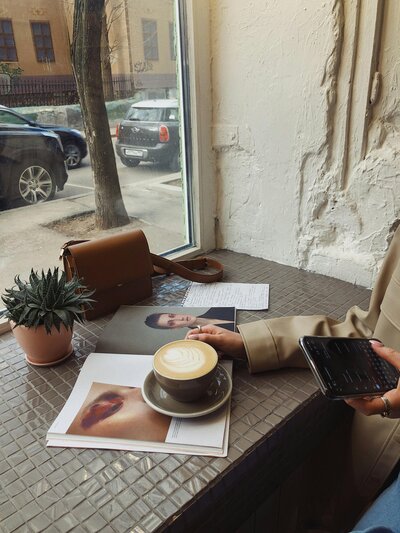 Gal sitting at coffee shop