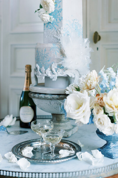 Wedding Photographer in Stockholm elopement photographer france helloalora Chateau de Courtomer intimate wedding dinner champagne toast and blue wedding cake