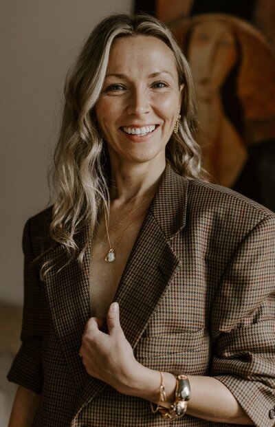 Woman owner of a company that offers high-quality modular jewelry, slow fashion, and sustainable living services in Hamilton, Ontario