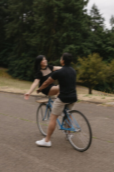 Engagement photos on a bicycle.