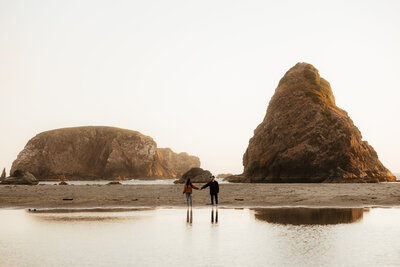 Brookings Oregon Engagement Photographer Couple Holding Hands on Beach