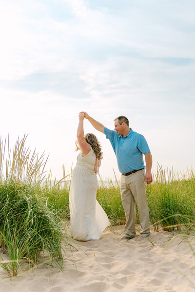 couple dancing at a beach in michigan