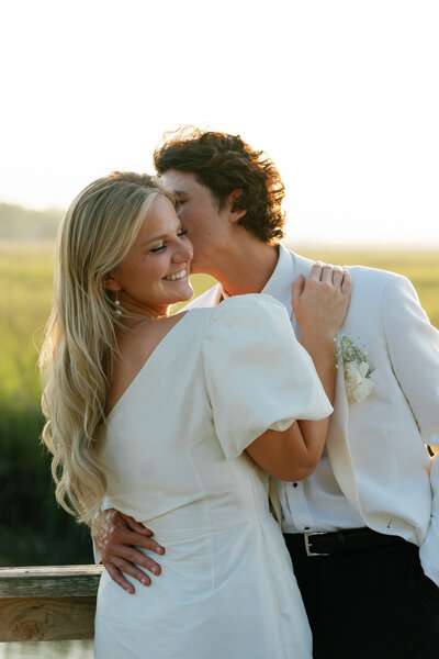 bride and groom embrace