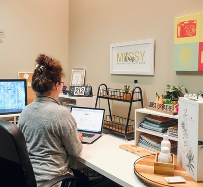 woman typing at computer