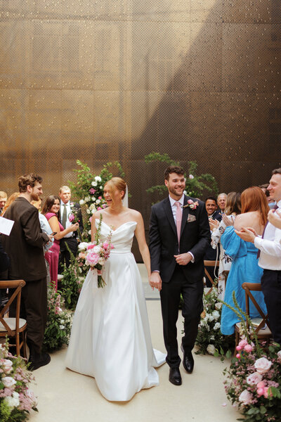 This stylish Hackney Town Hall wedding transformed the North & South Atria into a modern love story. Get inspired!