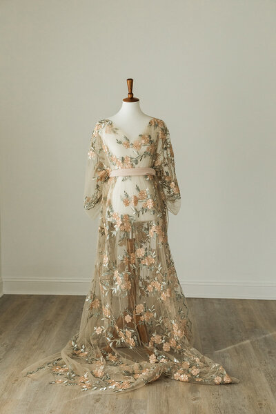 see-through tan dress with embroidered florals