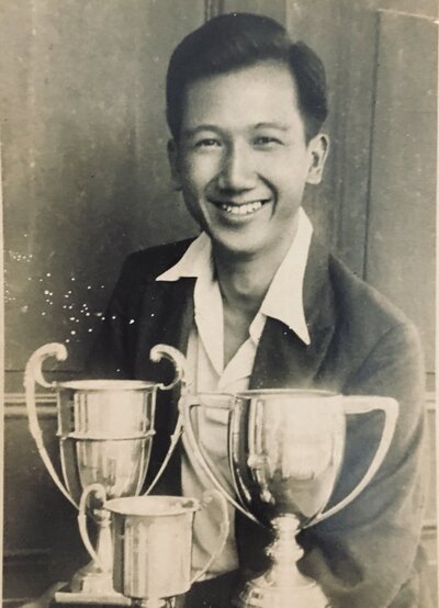 Maureen Tai grandfather with awards